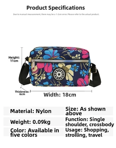 Detail view of floral nylon crossbody bag showing 18x11x6cm size and 0.09kg weight