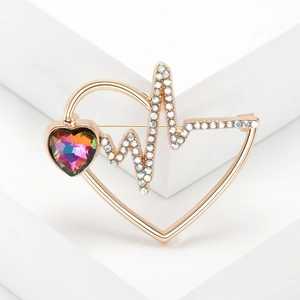Elegant gold heart EKG brooch with iridescent rhinestones on geometric stands