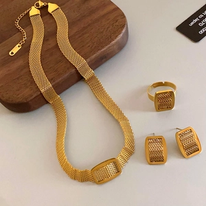 Golden mesh textured stainless steel jewelry set with necklace, ring and earrings