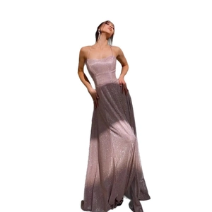 Sparkly rose pink backless evening gown with spaghetti straps and a side slit