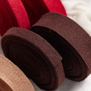 Thick wool felt Christmas ribbons in red and brown for DIY handmade holiday decorations