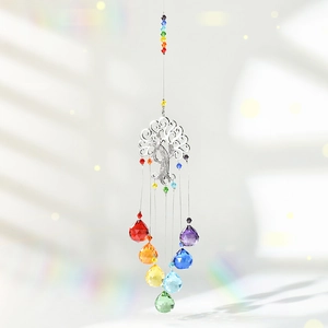 Detailed view of Tree of Life crystal suncatcher with rainbow prisms and silver accents