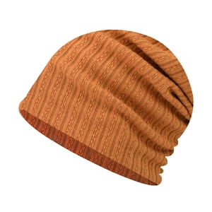 Orange-brown ribbed knit beanie for autumn winter featuring vertical striped texture