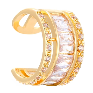 Detail of elegant gold ear cuff with multi-layered zircon and square baguette crystal