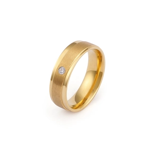 Anello minimalista in acciaio al titanio dorato con finitura spazzolata e diamante