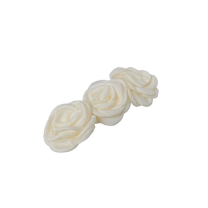 Elegant ivory fabric camellia hair clip featuring three satin roses for wedding hair