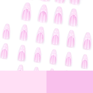Pink almond shaped press-on nails with a glossy finish shown in a scattered layout