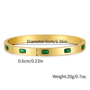 Gold titanium steel bangle with five green rectangular zircons and size measurements