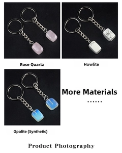 Detailed view of Rose Quartz, Howlite, and Opalite crystal rectangular stone keychains
