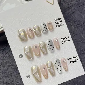 Polka dot and pearlescent coffin press-on nails set with rhinestone details