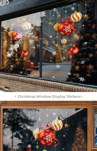 Détails des stickers de Noël avec boules rouges et dorées et ornements de flocons