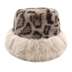 Detail of leopard print faux fur and cream fluffy brim on winter bucket hat