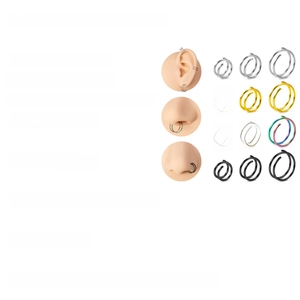 Detail showing 0.8mm stainless steel double spiral nose rings in various sizes and colors