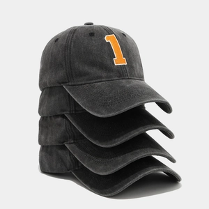 Detail of vintage washed charcoal baseball cap with orange embroidered number one