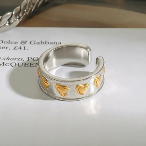 Bague ouverte ajustable en acier argenté avec motifs de cœurs dorés pour femmes