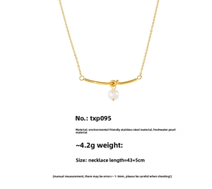 Detail of gold knot necklace with freshwater pearl pendant and stainless steel chain