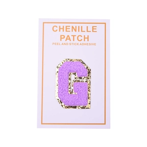 Detail of purple chenille letter G patch with gold sequins and adhesive backing