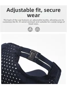 Detail of adjustable black plastic buckle and breathable mesh fabric on dark blue sport cap