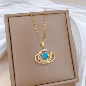 Titanium steel moon and star necklace with zircons on elegant brown jewelry display box