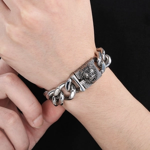 Men's hip hop silver stainless steel Cuban chain bracelet with a lion head buckle design