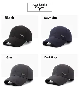 Detail of baseball caps in black, navy, and grey showing side metal brand plate
