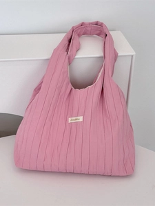 Pink pleated shoulder tote bag with minimalist logo label and large capacity design