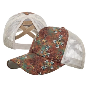 Detail showing vintage brown print and breathable mesh on ponytail baseball cap