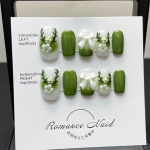 Handmade gradient green press-on nails with 3D white flowers and deer horn art