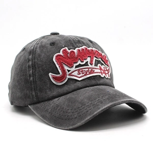 Close-up of vintage washed cotton baseball cap featuring NY 3D embroidery detail