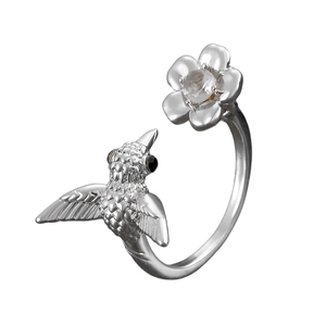 Vintage silver hummingbird and flower open ring with delicate gemstone accents