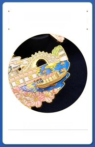 Detail of traditional Chinese garden fridge magnet with golden relief and floral patterns