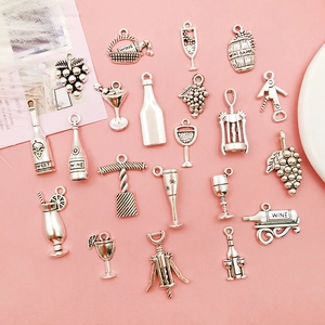 Detailed flat lay of silver wine-themed alloy charms with bottles and corkscrews