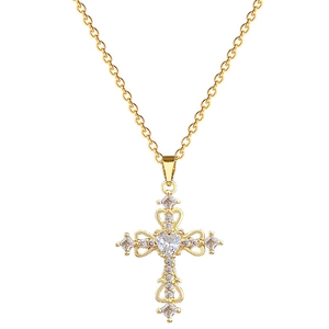 Elegant gold hollow cross necklace with heart crystal pendant on white background