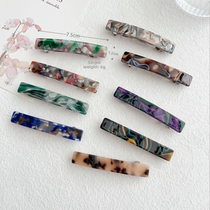 Acetate hair clips in various marble patterns with spring fastener, 7.5cm size detail