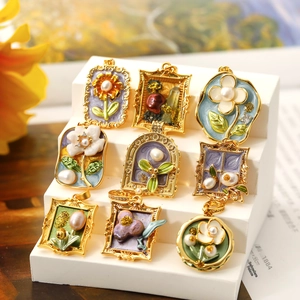 Vintage oil painting style gold frame pendant with floral details and baroque pearl accents