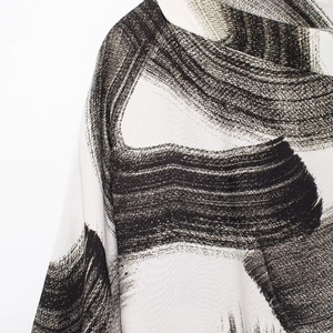 Elegant loose-fit round neck dress with artistic black and white brushstroke print