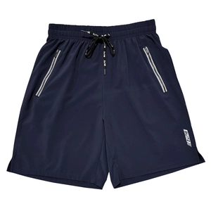 Detail of dark blue quick-dry sports shorts featuring reflective zipper pockets and drawstring