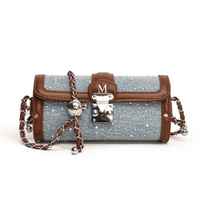 Denim cylindrical crossbody bag with rhinestones, brown leather trim and metal chain