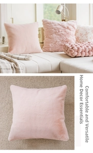 Detail of plush light pink sofa cushion covers with soft faux fur and velvet textures