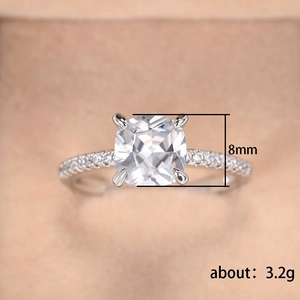 Macro shot of 8mm cushion cut zirconia ring with 3.2g weight and pave set band