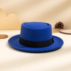 Detailed close-up of Royal blue flat top wool felt boater hat with black ribbon band
