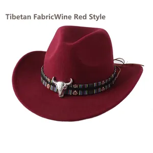Detail of burgundy wool western cowboy hat with ethnic rainbow band and silver bull skull