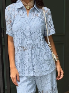 Women's light blue lace shirt and shorts set with delicate floral hollow out patterns