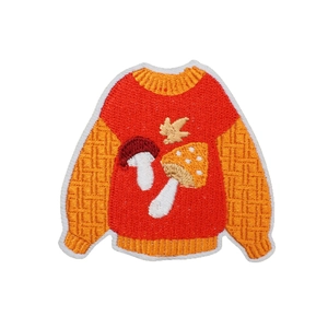Fall sweater embroidery patch with red and orange mushroom and maple leaf patterns