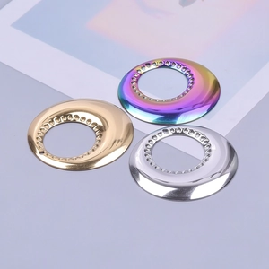 Polished 18k gold, silver, and rainbow stainless steel circular jewelry components