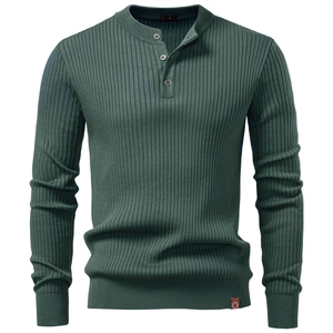 Detailed view of dark green ribbed knit fabric and three-button Henley collar texture