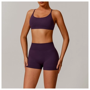Detail of plum purple seamless yoga set featuring thin straps and high waist shorts