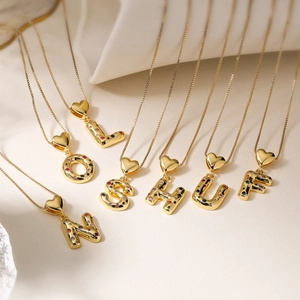 18K gold plated copper initial necklace with colorful zircon heart-shaped accents