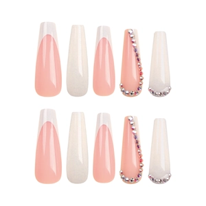 White and pink French tip press-on nails with colorful rhinestones in coffin shape