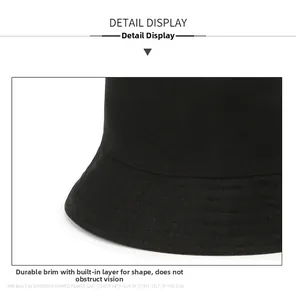 Detailed close-up of a black cotton bucket hat brim showing fabric texture and firm stitching